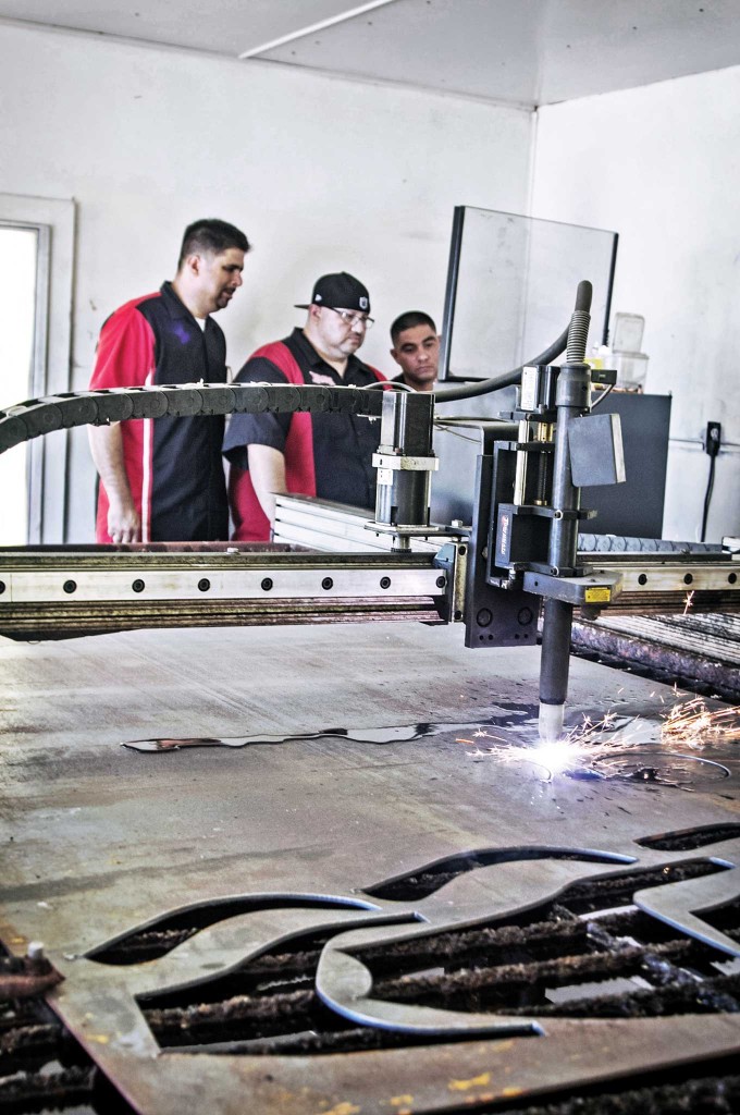 A custom fab company with a CNC machine, plasma water table, and laser-cutting machine at your service