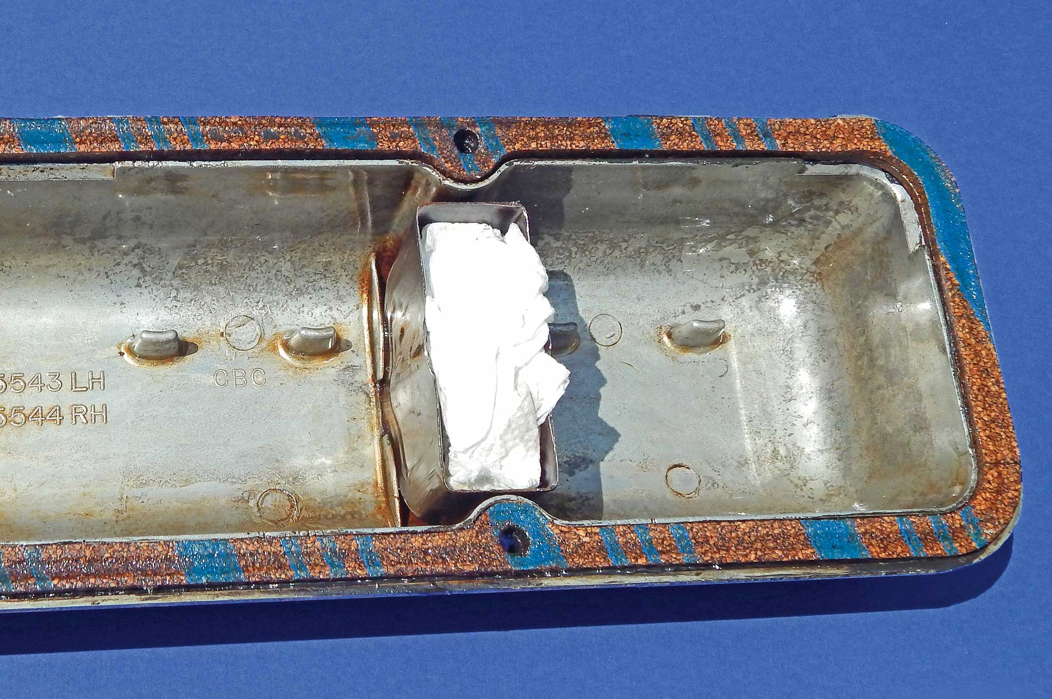 Finding and Stopping Chevy Valve Cover Leaks Baffle Blocking Lowrider